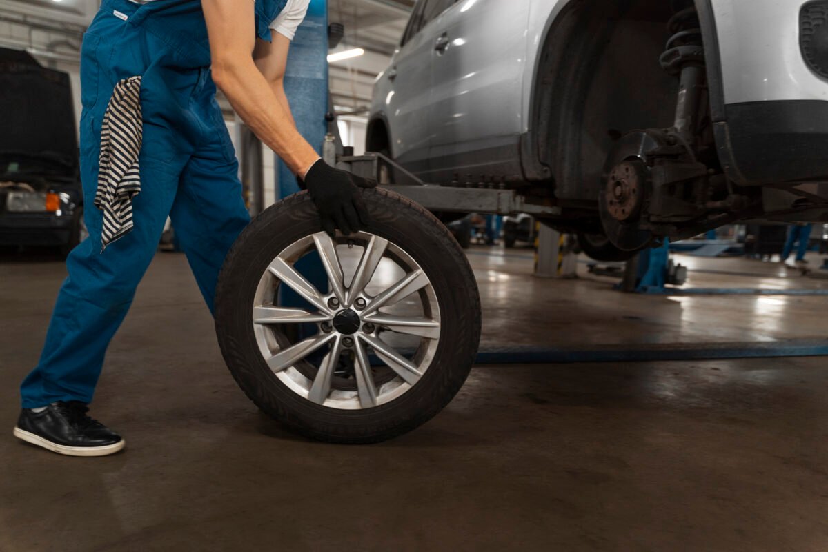 mechanic-working-shop-car
